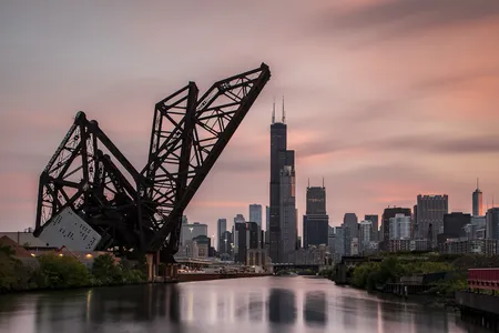 Built in 1917-1919, the St. Charles Air Line Bridge is one of the oldest in Chicago and has been designated a city landmark. It&rsquo;s still in use for freight and cargo trains, and it lifts for boats and ships passing underneath.