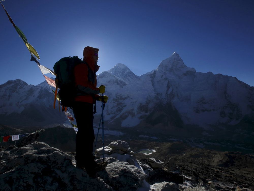 Hiker looking at Mount Everest