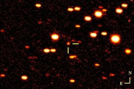 Comet ISON, still just a faint glimmer at the crosshairs of this telescope image, could be the brightest comet in a generation next November.