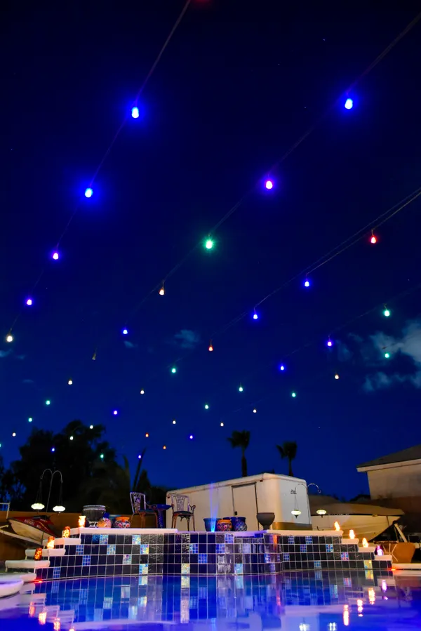 Lights Strung out over a Swimming Pool thumbnail