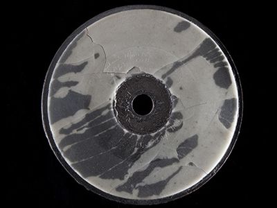 This wax-and-cardboard disc from 1885 contains a recording of Bell’s voice.