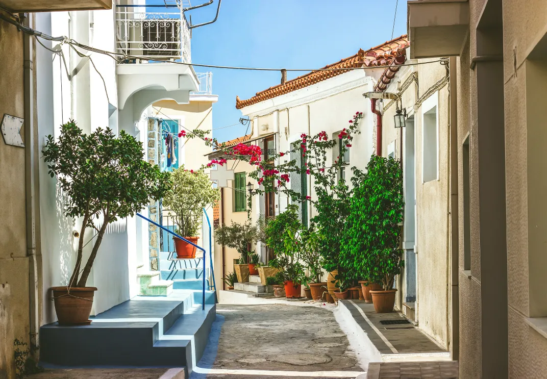 A narrow lane in Neorio, a village near the main town on the Greek island of Poros