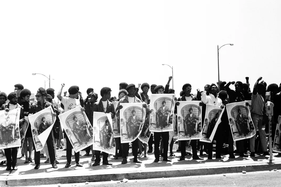 Black Panthers hold Free Huey signs at a rally at the Alameda County Courthouse in Oakland, California, in September 1968.