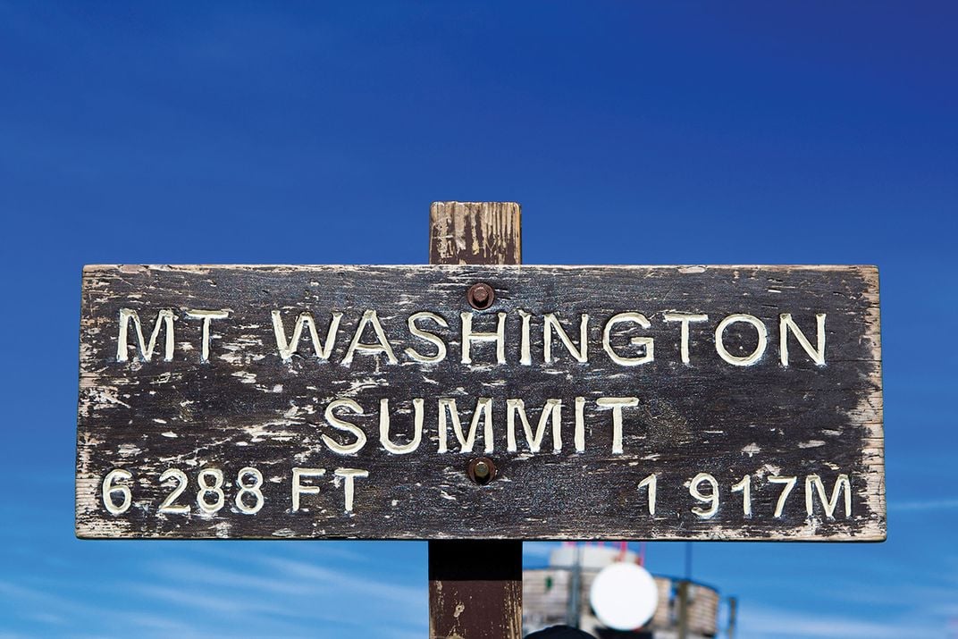 a wooden sign on Mt. Washington Summit