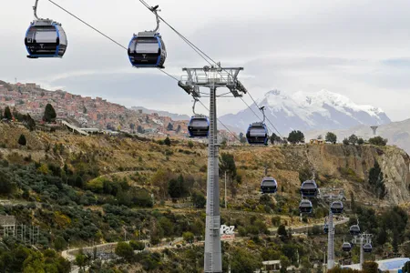 The systems have been especially successful in Latin America, where massive cities and dramatic landscapes make building roads, rail lines and subway tunnels difficult. Mi Tel&eacute;ferico, shown here, connects more than two million people across the La Paz metro in Bolivia.