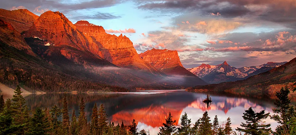  Vivid sunset over Glacier National Park.  Credit: Tom Crouse