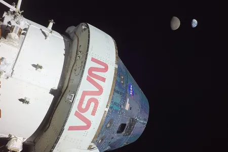 A photograph featuring the conical silver Orion spacecraft and cylindrical European Service Module in the foreground as it travels through space. In the background the Moon and then the Earth can be seen in the far distance.