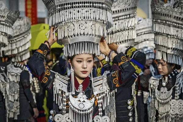 Women in Traditional Ethic Attire Walking Slowly thumbnail