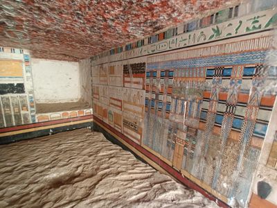 The tomb&#39;s walls are painted and carved with images of objects the doctor might have used.