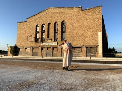 Adam W. McKinney dances&nbsp;in front of a former KKK headquarters in Fort Worth.&nbsp;







