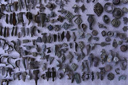 Authorities grew suspicious of the man after he claimed to have found 14,000 Roman coins in a Belgian orchard.