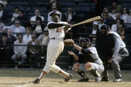 Frank Robinson taking a swing during a circa late 1960s Major League Baseball game at Memorial Stadium in Baltimore, Maryland.
