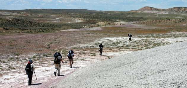 On the march back from the Death March site, everyone carries bags of sediment