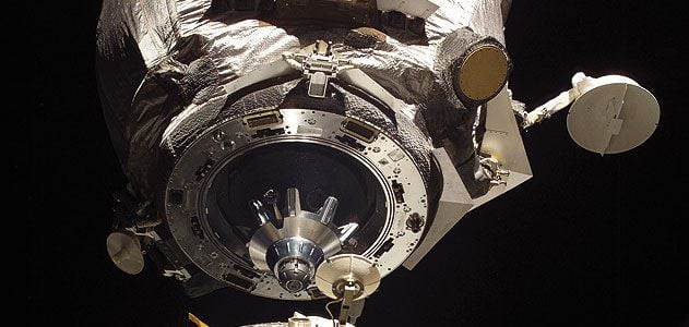 The Soyuz docking assembly's mating adapter is shown in space just feet away from the International Space Station.
