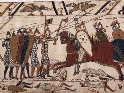 Mounted Normans attack the Anglo-Saxon infantry during the Battle of Hastings, as portrayed on the Bayeux Tapestry. 