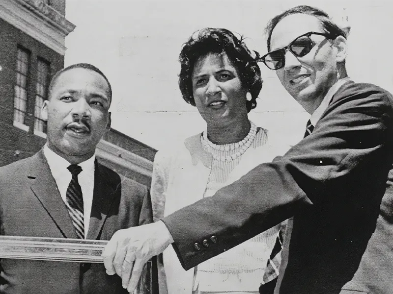 A photo of Motley Baker with Rev. Martin Luther King Jr. and William Kunstler