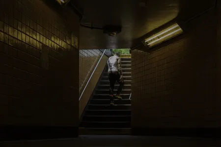 A man exits the Euclid Avenue stop in Brooklyn.