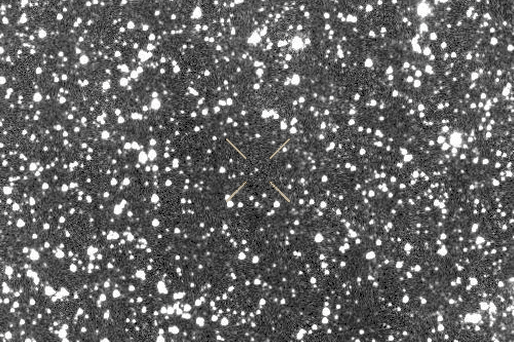 in a gif, one point of light among many stars moves across the screen in a black and white series of images of the night sky