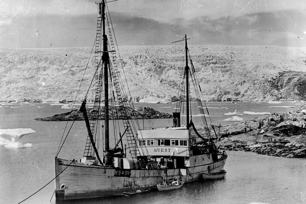 Black and white photo of ship with the word QUEST on it