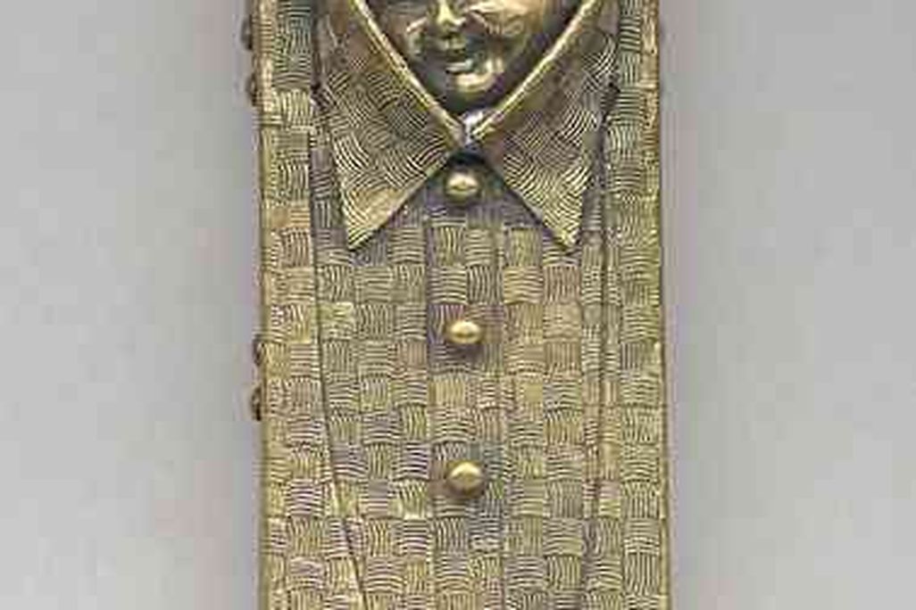 Matchbook in the shape of a folded men’s shirt
