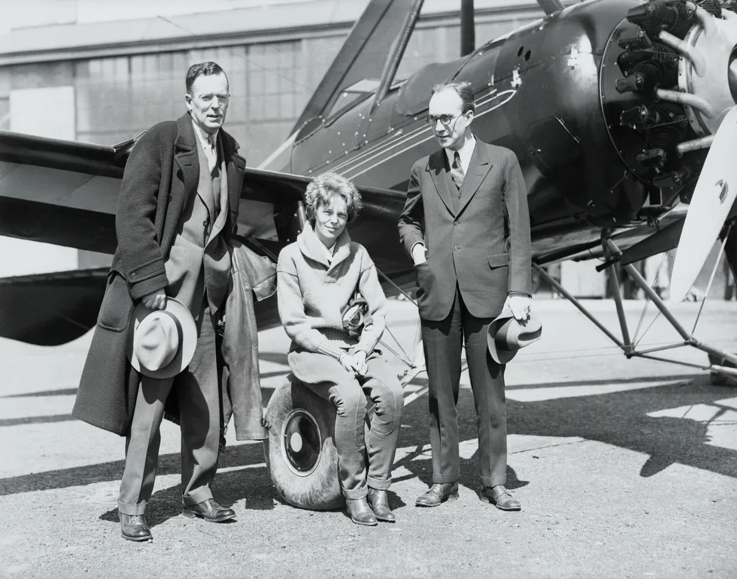 Amelia Earhart with husband George Palmer Putnam, Jr (left) and Harold Pitcairn