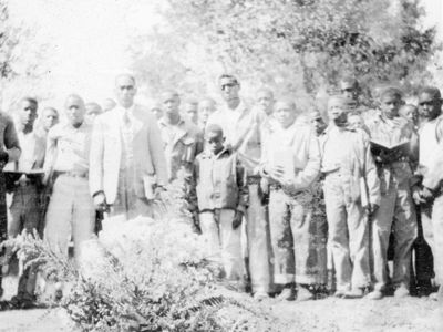 A group photo taken at what might have been a memorial or funeral service at the Florida School for Boys in the 1950s