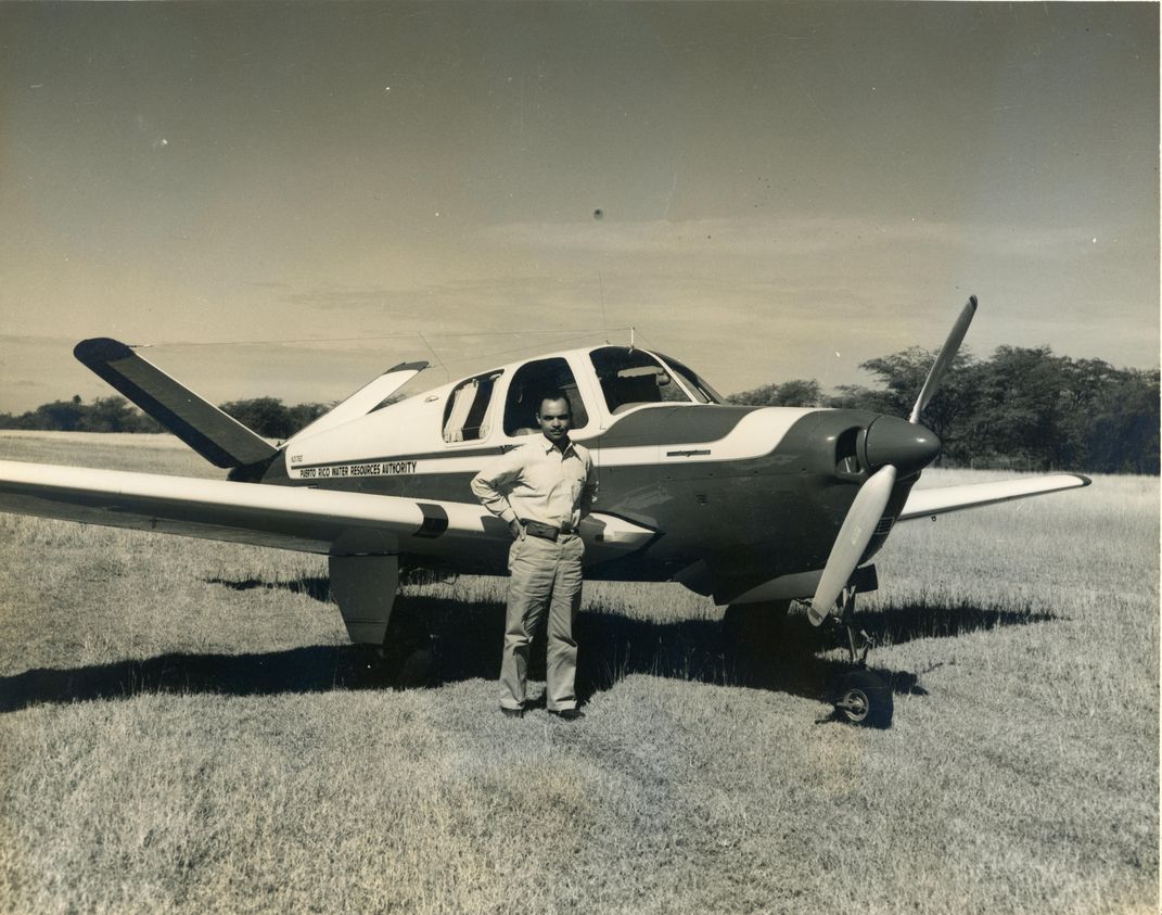 Young with Puerto Rico Water Resources Authority helicopter