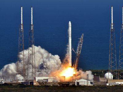 SpaceX's Falcon 9 rocket, shown here at its launch Tuesday, is expected to successfully deliver the Dragon spacecraft's payload to the International Space Station, but the rocket again failed to touch down at a free-floating pad in the ocean.