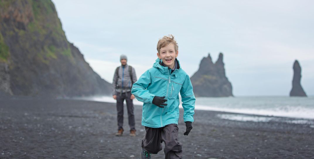Father and son at Reynisfara