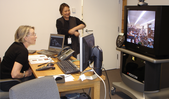 Volunteer Helen Dickerson (L) and staff member Colleen Brown (R) connected with students for virtual lessons from 2004-2011; Photo by SAAM staff.