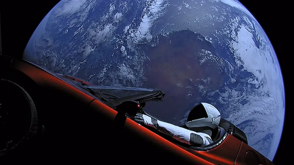 Elon Musk's Tesla Roadster on the Falcon rocket, with Earth in background