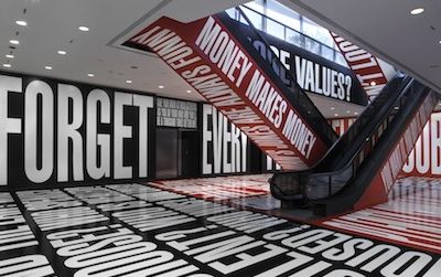 The artist’s black, white and red phrases titled Belief+Doubt exist outside the traditional galleries.