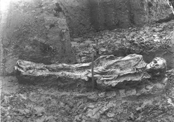 The first bog body ever photographed, which was discovered in Denmark in 1898.