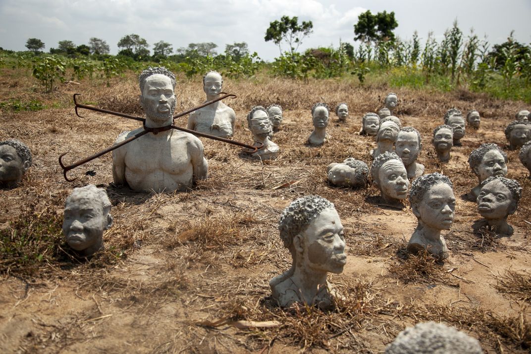 Concrete busts of enslaved Africans by Ghanaian sculptor Kwame Akoto-Bamfo
