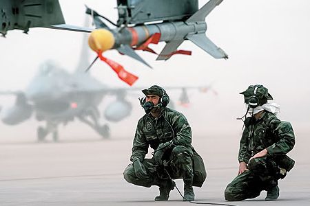 During Desert Storm, most fighters packed Sidewinders: F-16s armed with the missiles await the next mission.