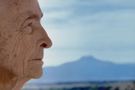 Georgia O&rsquo;Keeffe poses at her home, Ghost Ranch, in New Mexico. The artist often drew on imagery of the American Southwest in her work.&nbsp;