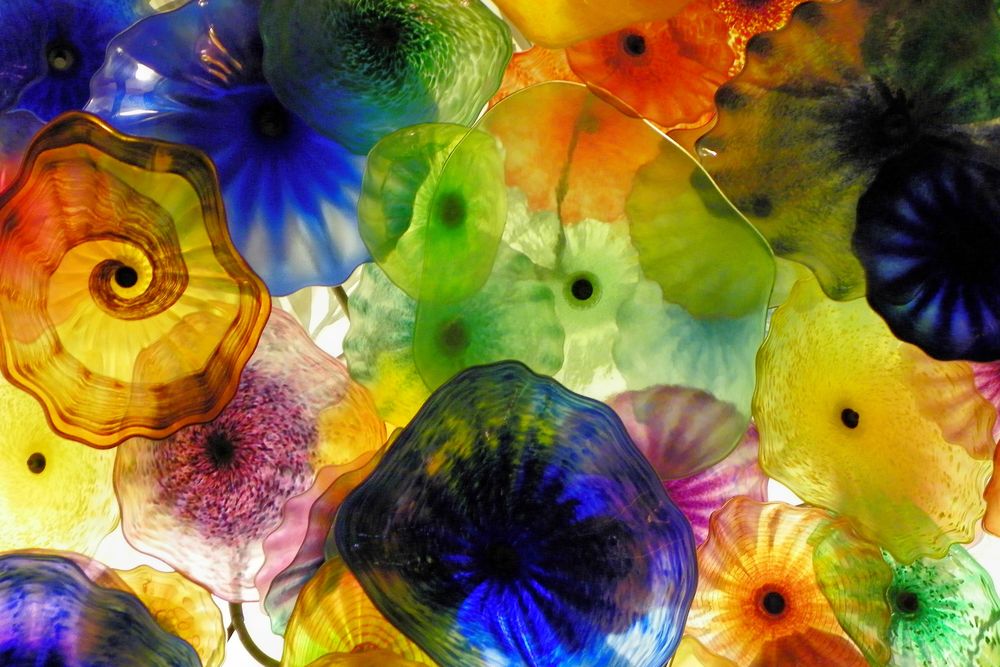 OPENER - Made with more than 2,000 hand-blown glass flowers, artist Dale Chihuly created Fiori di Como, this colorful ceiling of the Bellagio Hotel in Las Vegas.