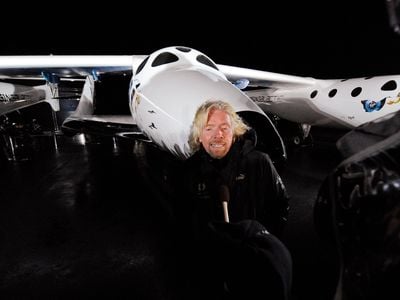 Billionaire Richard Branson is interviewed after unveiling Virgin Galactic's SpaceShipTwo in Mojave, California December 7, 2009.