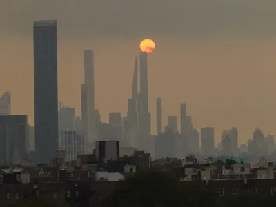 Smoke from wildfires in Canada blankets the New York City skyline in a haze in July 2023.