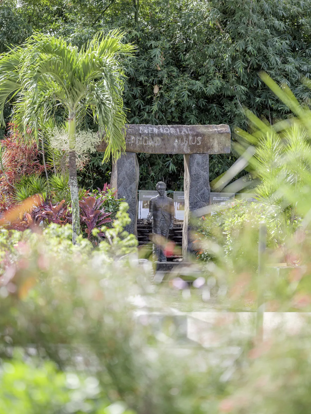 A bronze memorial and statue designed by Réunion artist Jack Beng-Thi in Sainte-Suzanne honors Edmond Albius, who discovered how to pollinate vanilla flowers by hand.