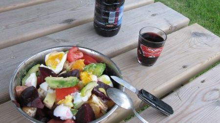 The table is set with a heaping salad of beets, soft-boiled eggs, orange and avocado. Dressed with a zesty walnut oil vinaigrette, this dish goes exceptionally well with an anonymous red Gascogne blend from a wine shop bulk barrel.