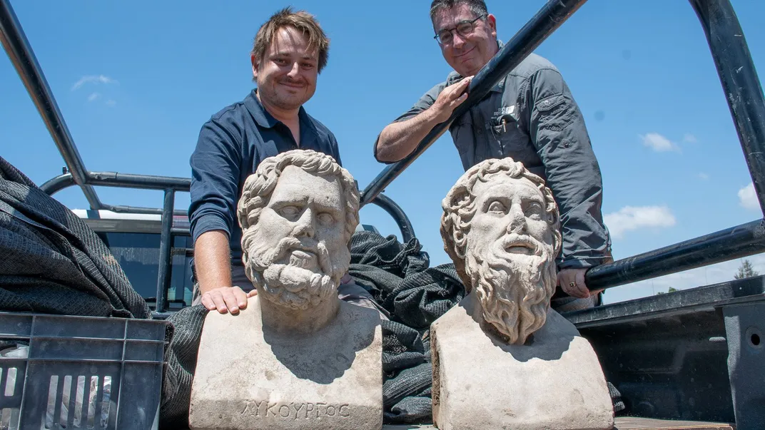 Archaeologists and statues