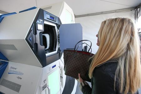 A woman uses the Qylatron at Levi's Stadium.