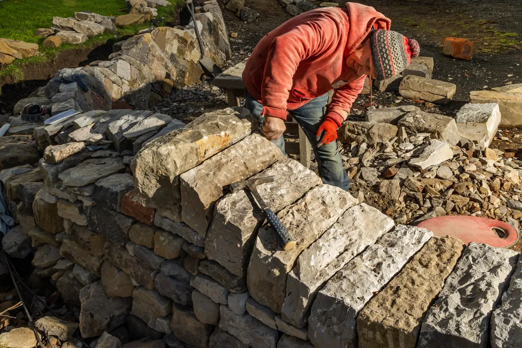 Wilson working on a Covid-19 memorial wall