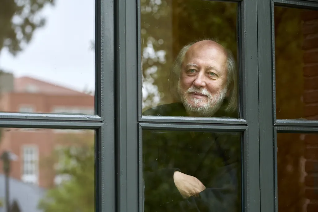 Man (László Krasznahorkai) staring out window