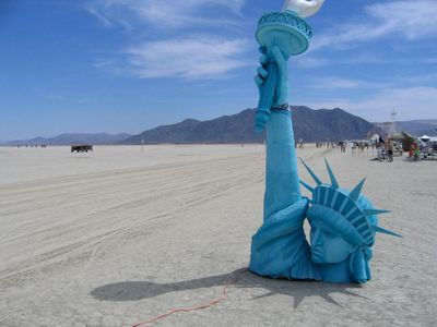 A Burning Man tribute to the last remnants of humanity, a buried Statue of Liberty, depicted in the 1967 science fiction film, Planet of the Apes. 