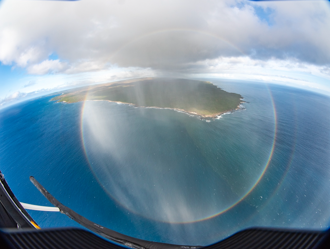 An photo of a "circle bow" rainbow from a helicopter 