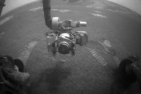 The Spirit and Opportunity rovers wait out a summer storm.