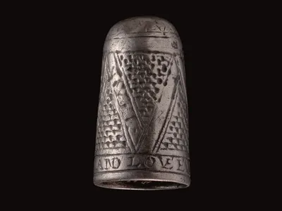 Metal Detectorist Discovers 300-Year-Old Silver Thimble Engraved With a Romantic Inscription image
