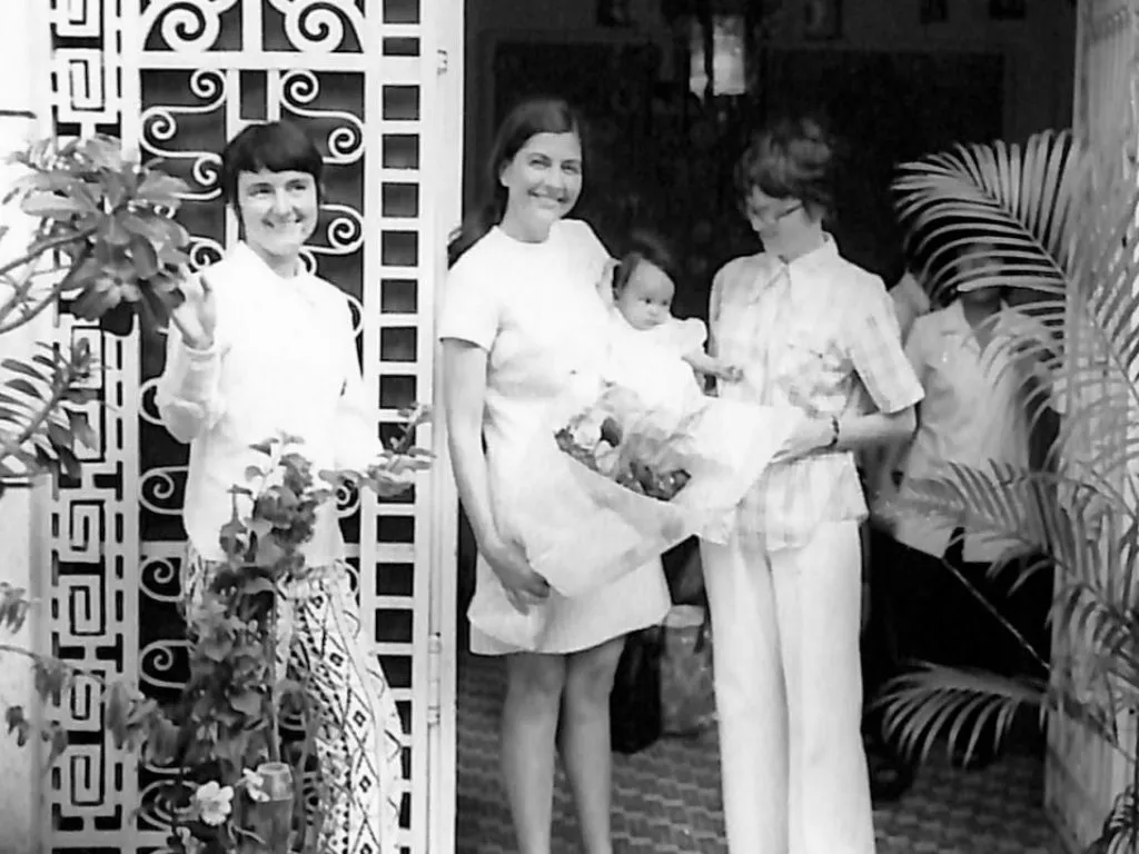L to R: Mary Nelle Gage, Rosemary Taylor and Susan Carol McDonald standing at the entry to New Haven nursery in 1974
